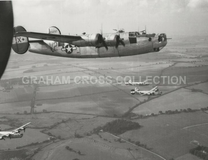 B-24 Liberators from the 491st Bombardment Group head over England
