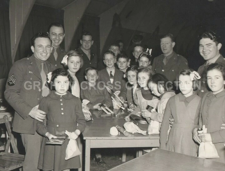 Christmas Party for local children in the American Red Cross Aeroclub at Raydon, 1944.