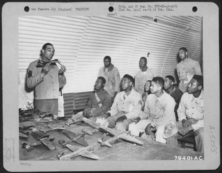 M/Sgt. Muckleroy from Texas teaches a class on aircraft identification at Eye, June 1943. (USAF)