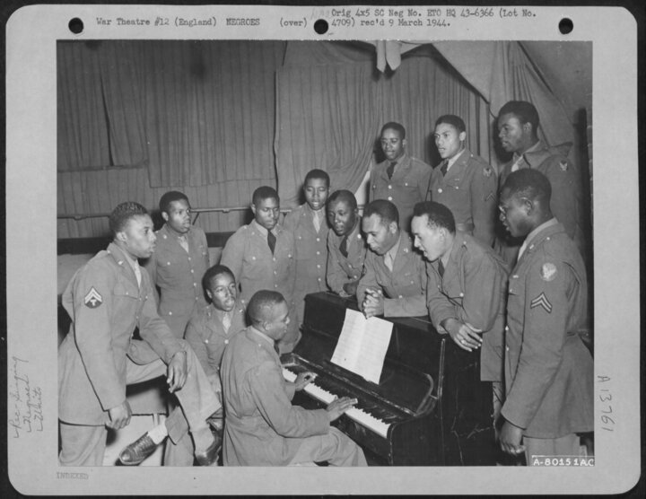 Members of the Chorus practice at Eye September 1, 1943. (USAF)