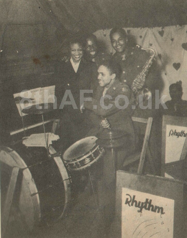 The 'Rhythm Rockets' play for a Valentine's Dance in the American Red Cross Club.