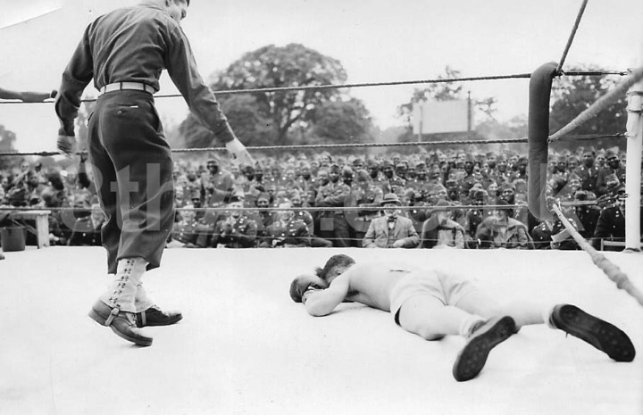 A genuine 'knock-out' during the boxing exhibition for 'Joe Louis Day.' (Hallock Collection)
