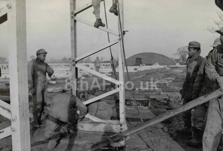 Men of the 859th Engineer Battalion prepare posts for T2 Hangar No.1. Note the posts stockpiled in the background (Hallock Collection)
