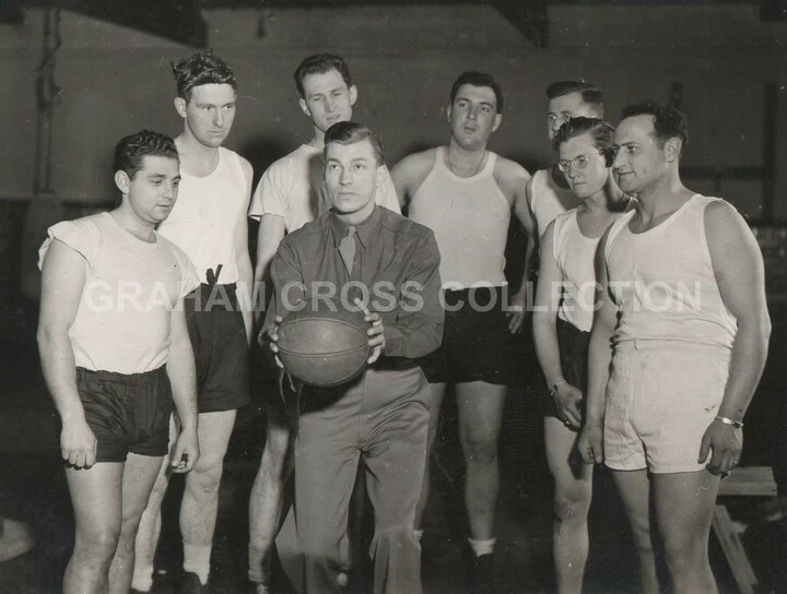 Martlesham Heath’s Station Basketball Team. We believe the centre player is a ‘star’ player on a tour of stations, but is currently unidentified.