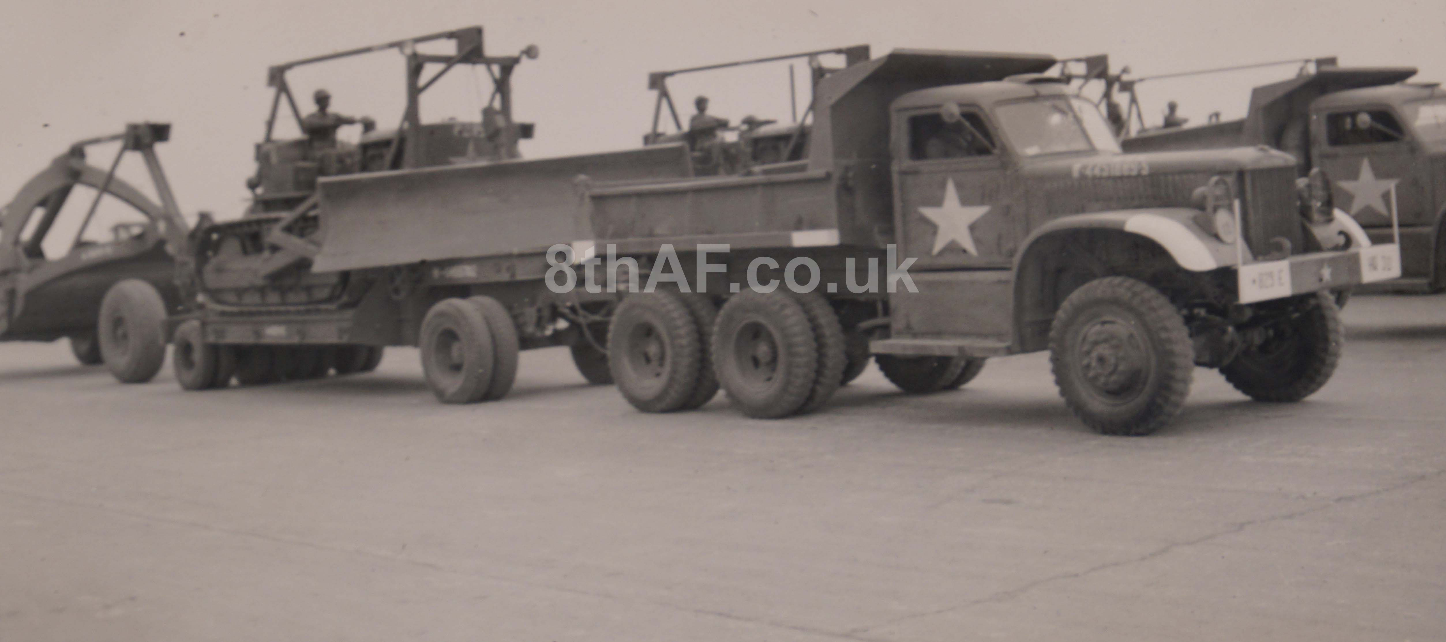 Trucks of the 829th on parade at the Deback handover ceremony, May 1, 1944. (Hallock Collection)