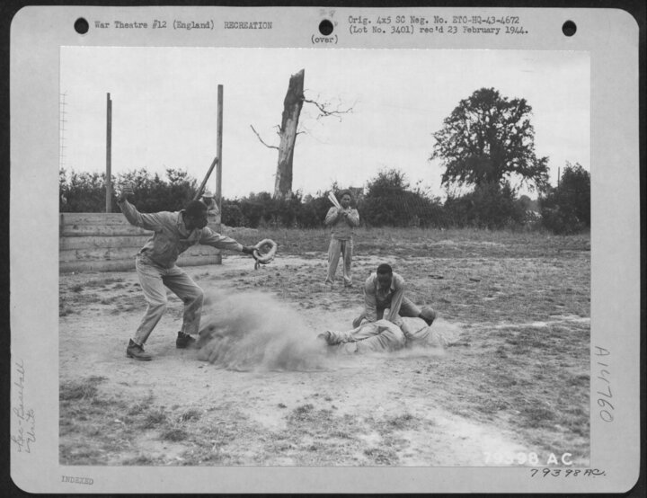 Men of the 923rd enjoy a game of baseball at Eye, June 1943. (USAF)