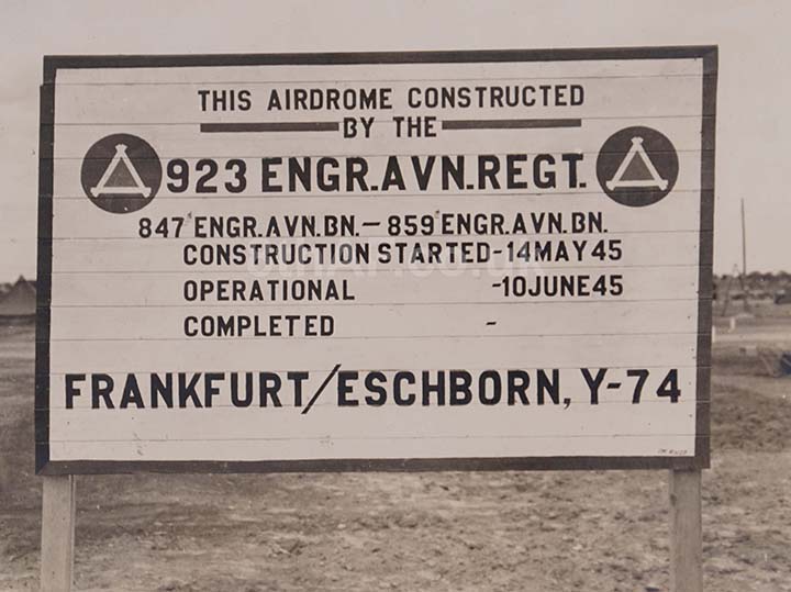 The end of the line for the 923rd Engineer Aviation Regiment. Here the men under the command of Col. Hallock proudly advertise their impressive achievement and contribution to the final defeat of Nazi Germany at Frankfurt/Eschborn in the summer of 1945. A job well done in the face of considerable and unnecessary obstacles. (Hallock Collection)